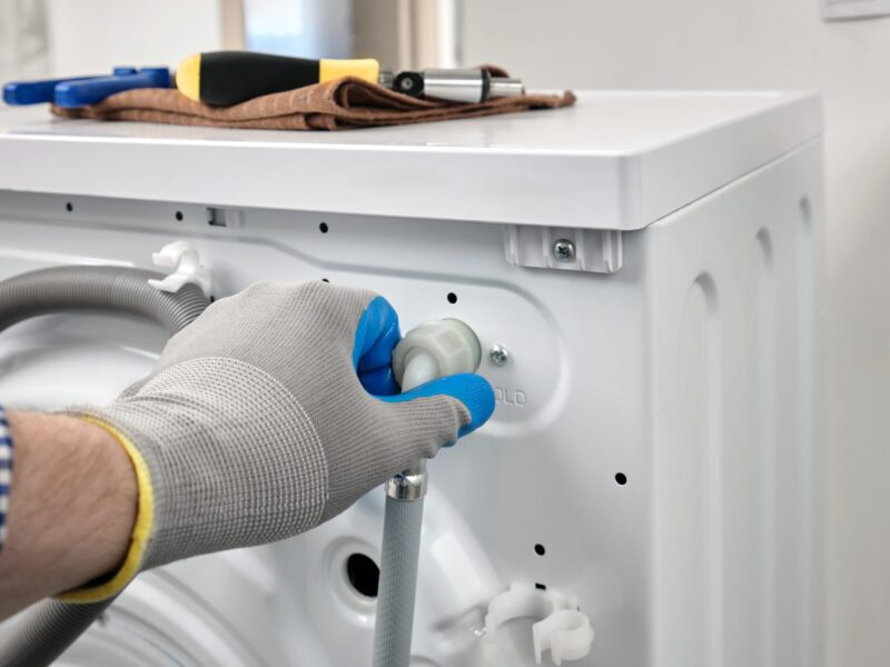 Plumber,In,Gloves,Repairing,Washer,On,Back,Side,Water,Supply